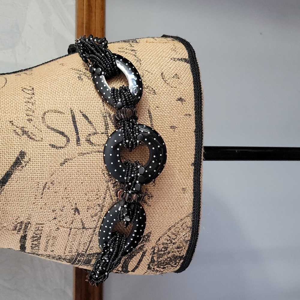 Chico's M-L adjustable black leather and bead decorative belt up to 44"